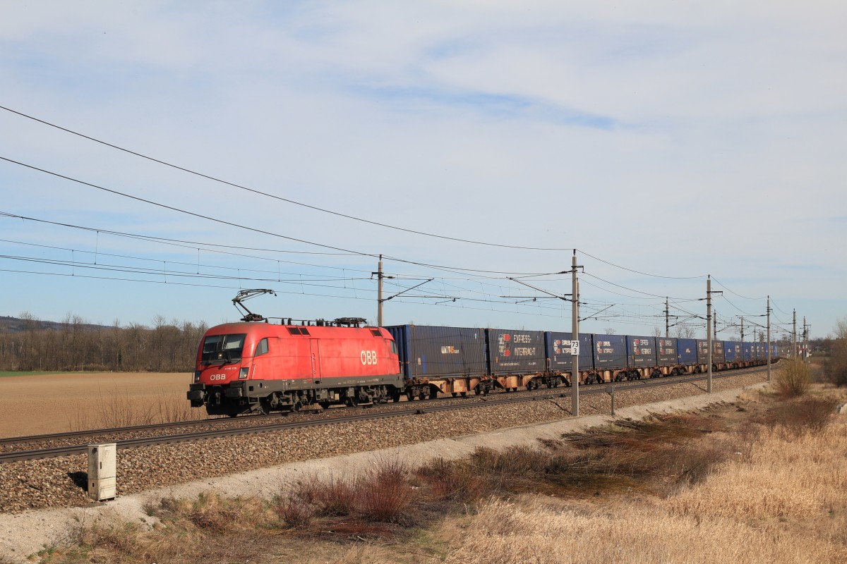 1116 170-2 mit einem Containerzug am 20. M�rz 2014 bei Gro�sierning.
