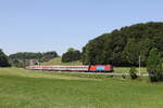 1116 077  Industriellenvereinigung  war mit einem  EC  am 26. Mai 2026 bei Axdorf im Chiemgau in Richtung Salzburg unterwegs.