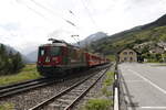 Ge 4/4 II 620  100 Jahre Bever-Scuol  bei der Ausfahrt aus dem Bahnhof von  Ardez  in Richtung  Scuol  am 11.